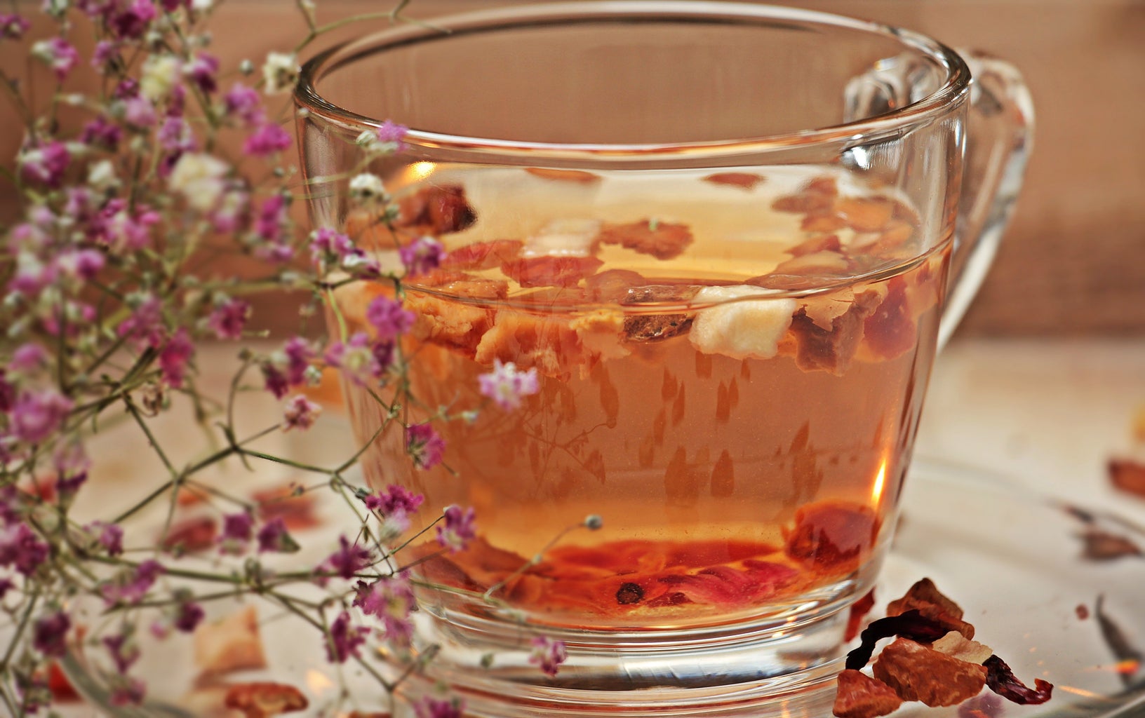 Breakfast tea with flowers and strawberries