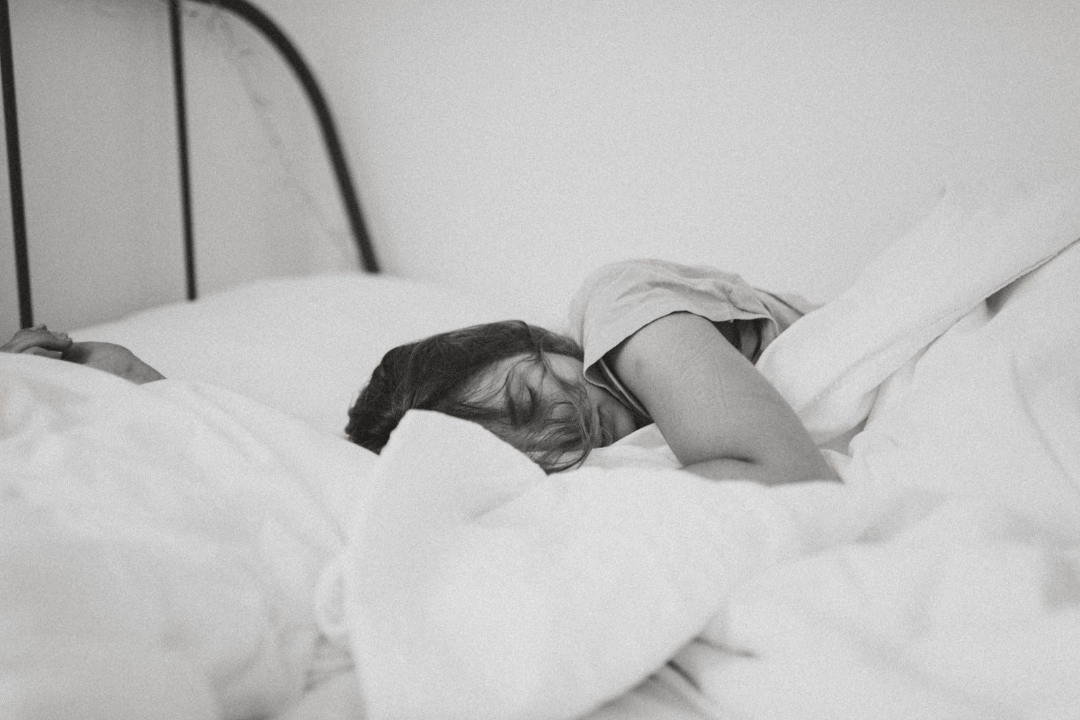 girl sleeping in black and white