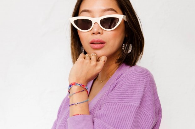 Aimee Song showing off her \"Journey Collection\" jewelry line