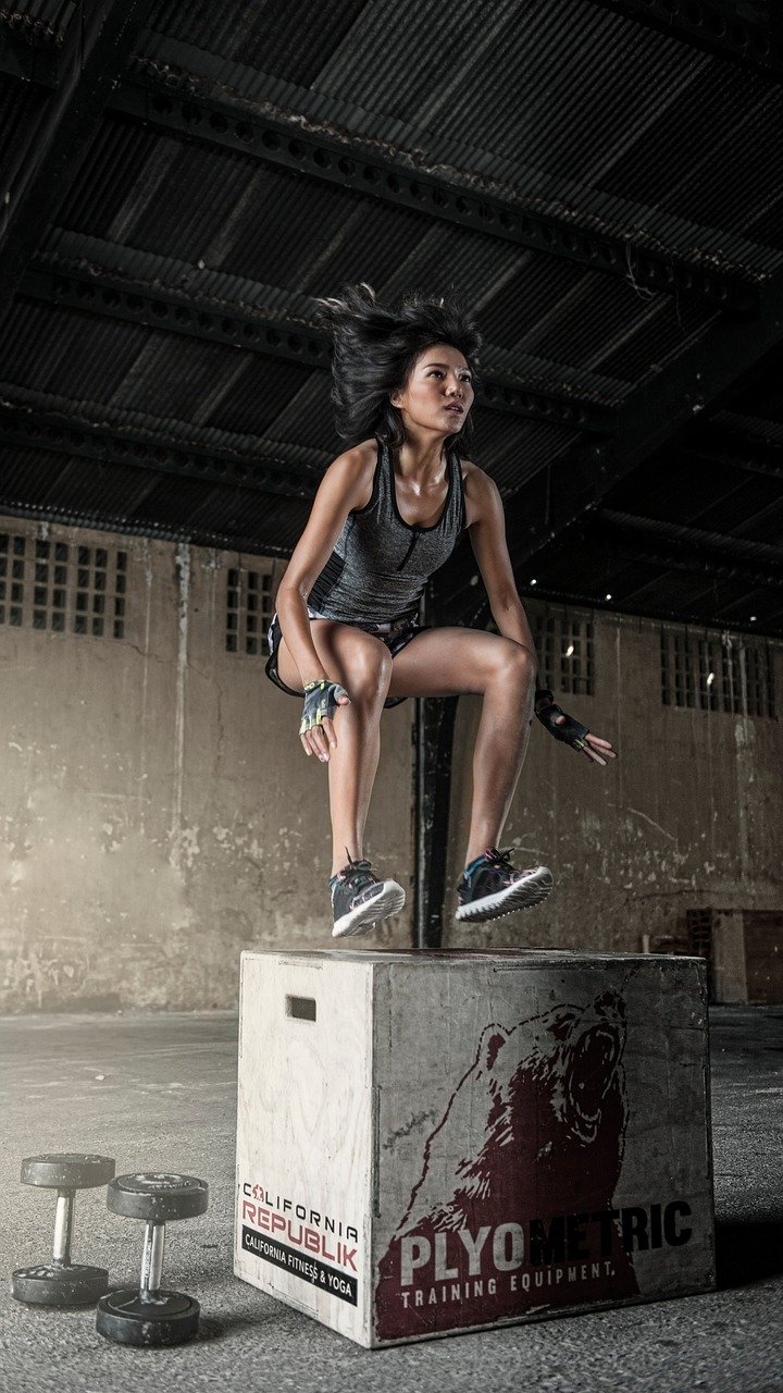 Woman doing box jumps