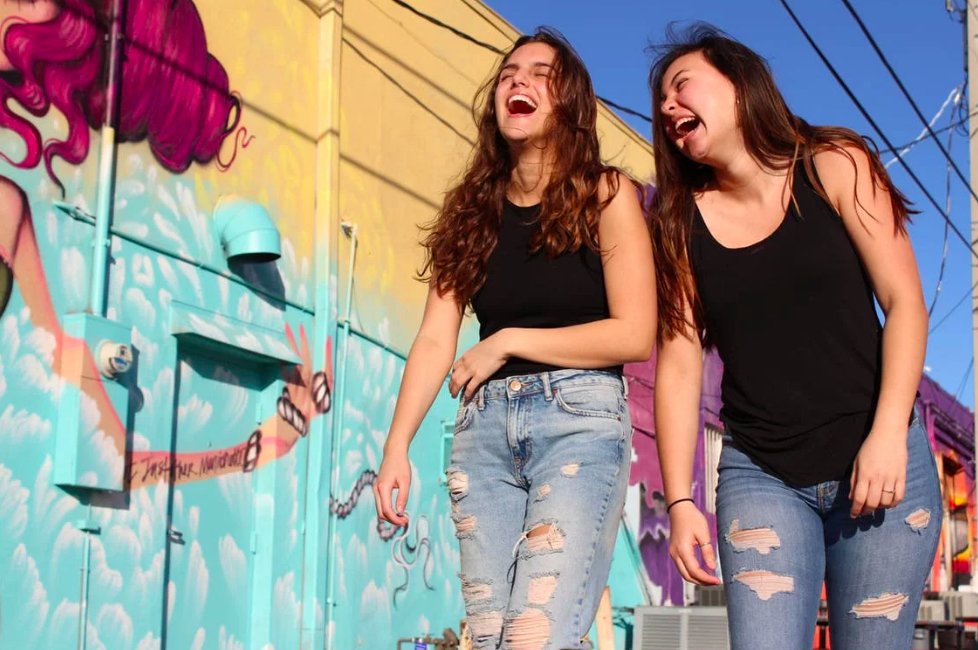 two friends laughing