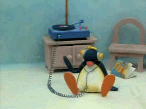 Gif of penguin listening to music