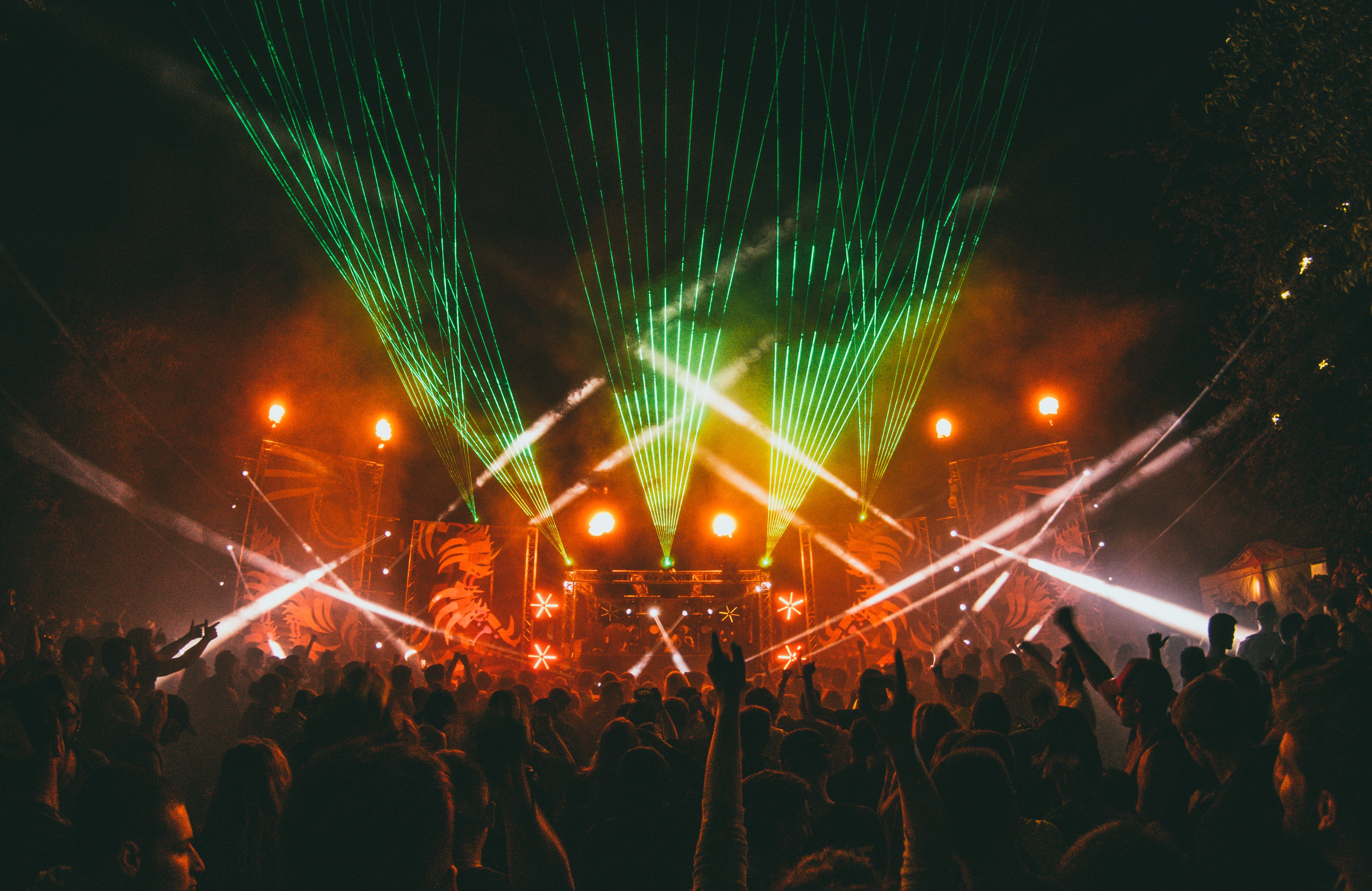 concert with lasersjpg by Unsplash?width=698&height=466&fit=crop&auto=webp&dpr=4
