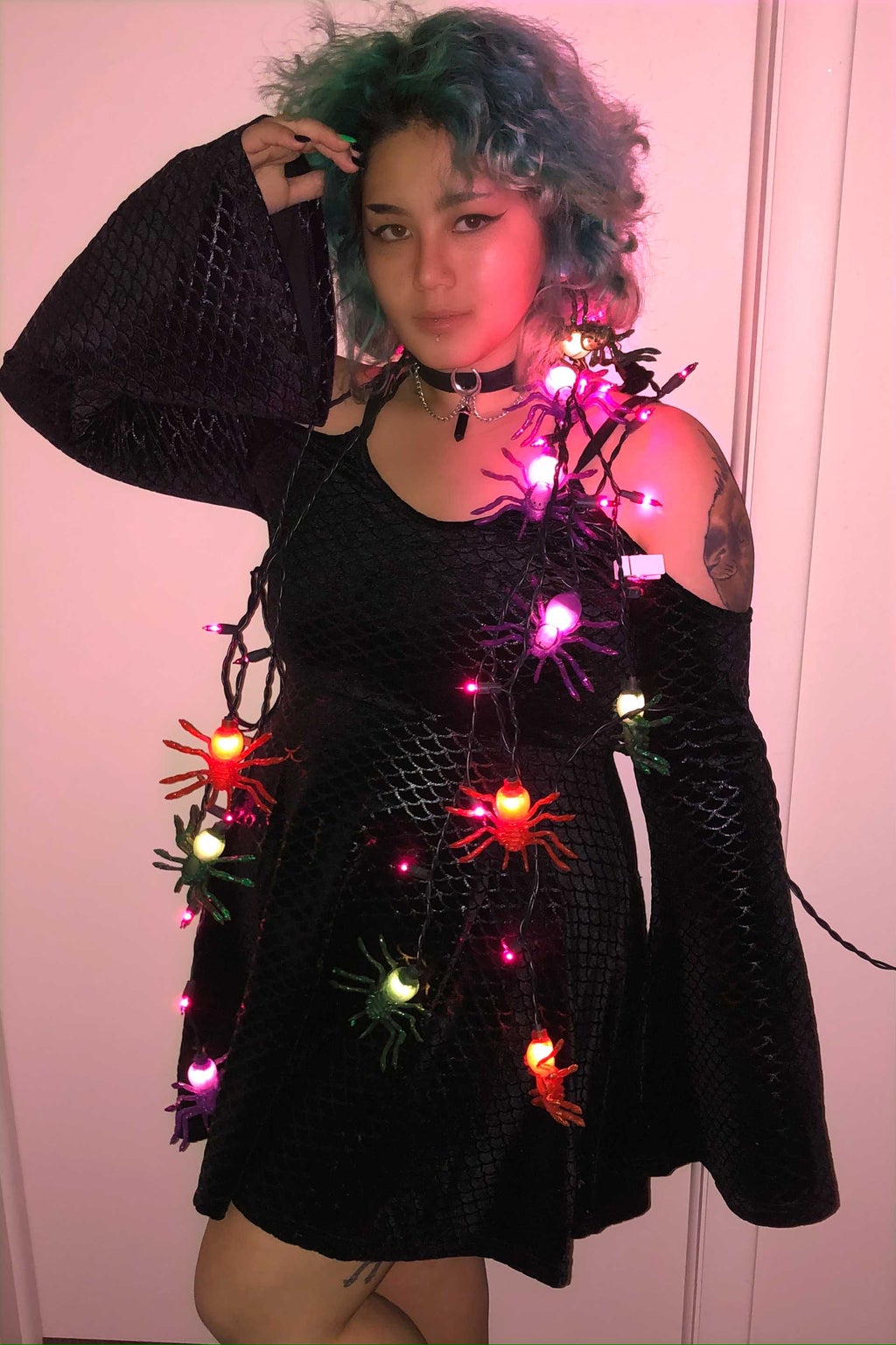 Picture I took of myself in a black dress with spider lights