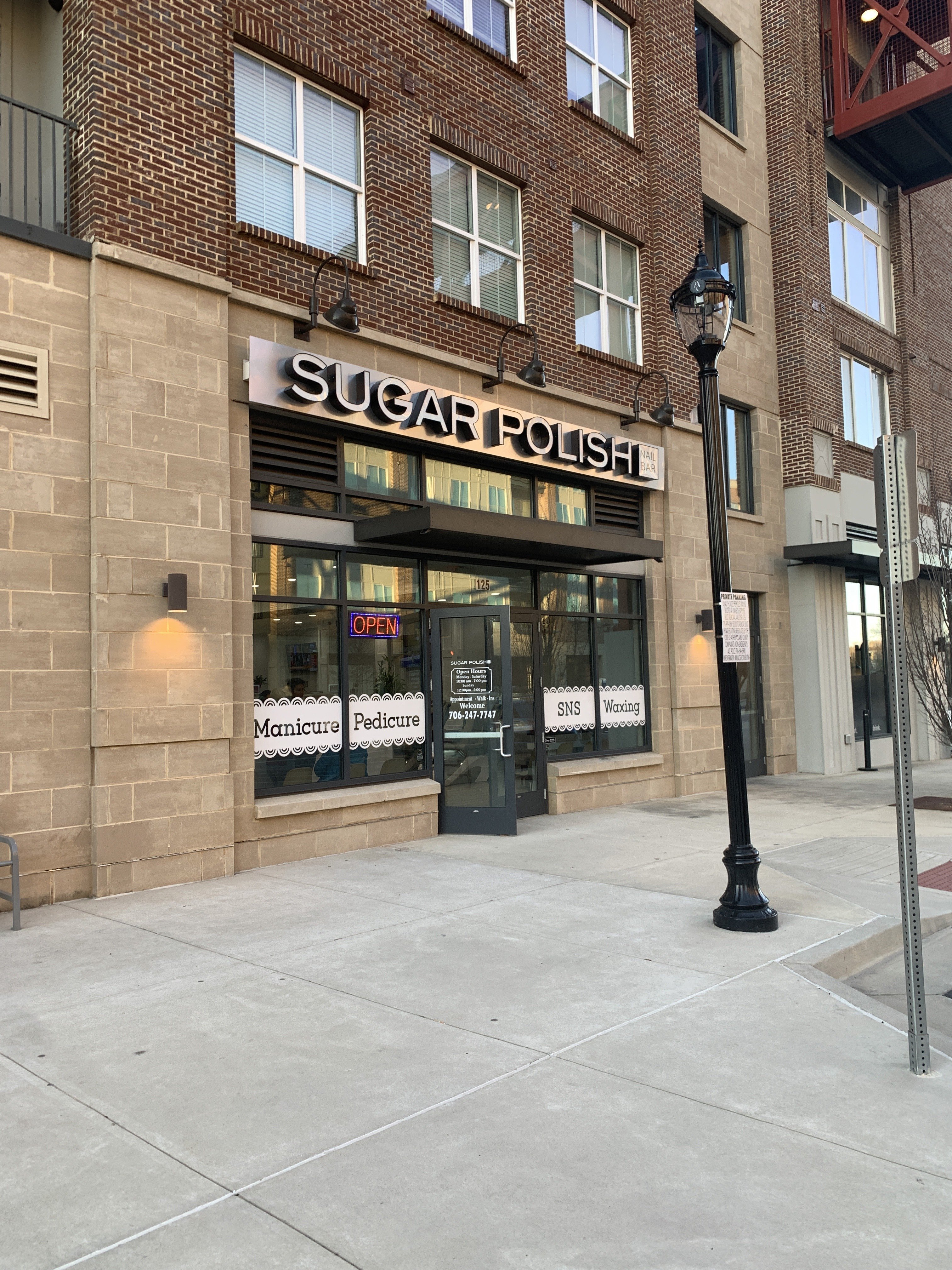 sugar polish nail bar far shot