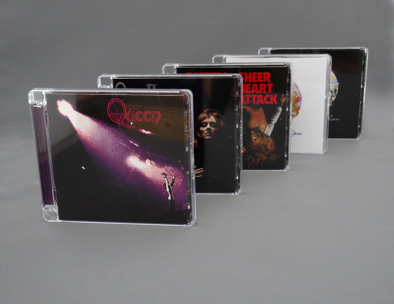 stack of queen cds