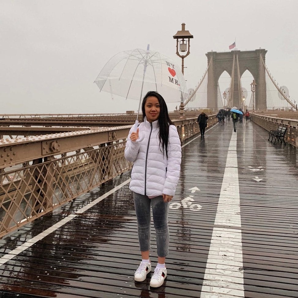 girl in New York City Brooklyn Bridge