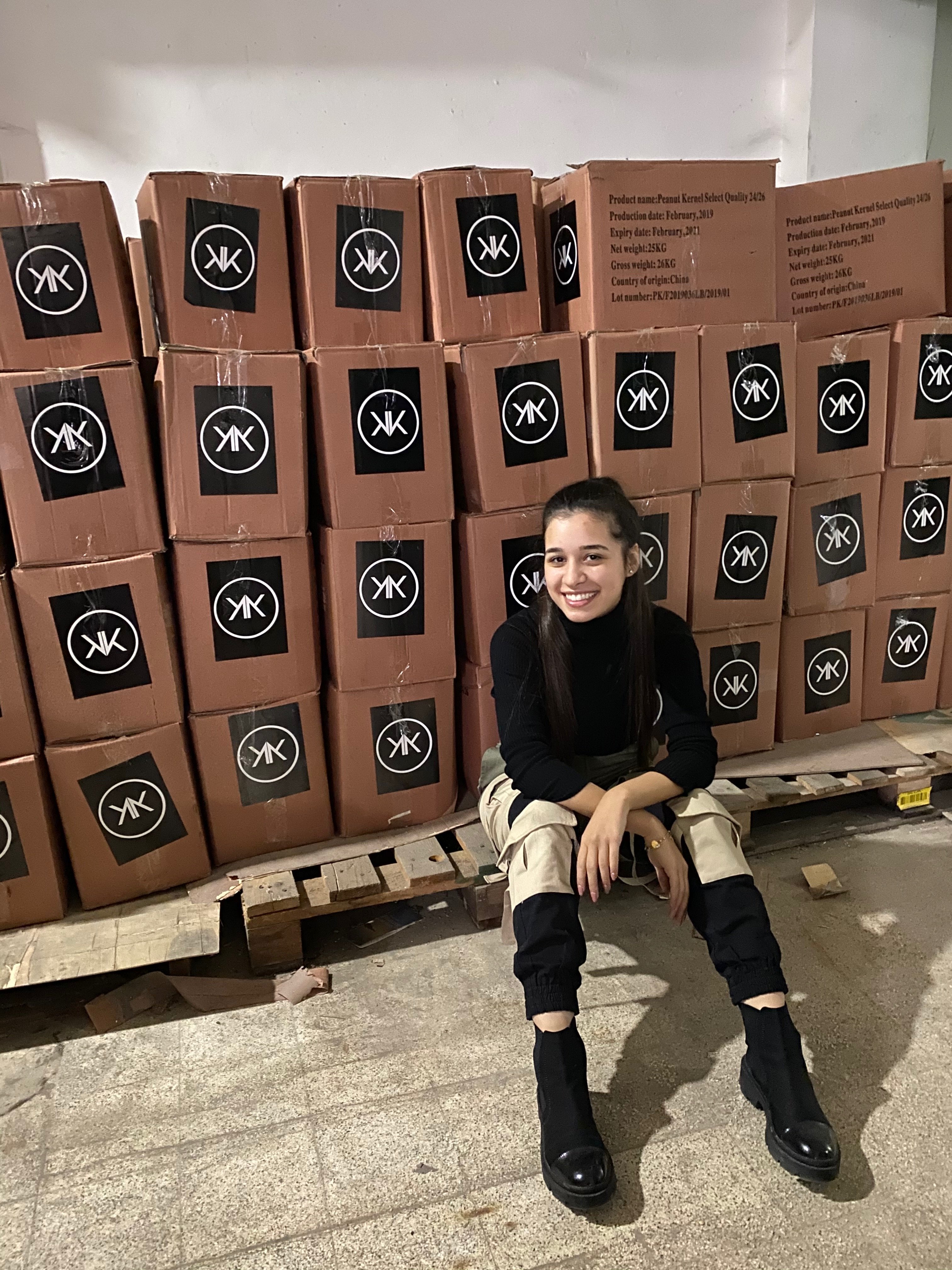 Woman putting together meals for charity work.