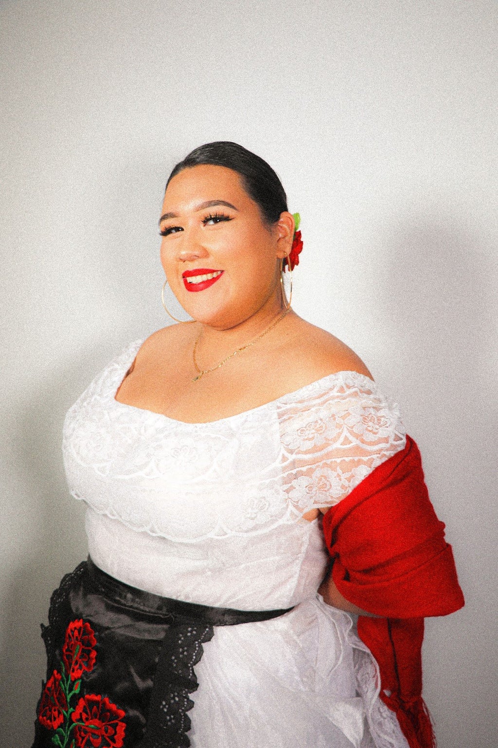 Alejandra Balbuena posing in her folklorico costume