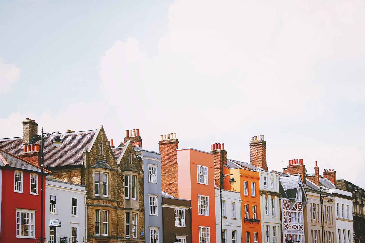 Row of assorted multicolored houses