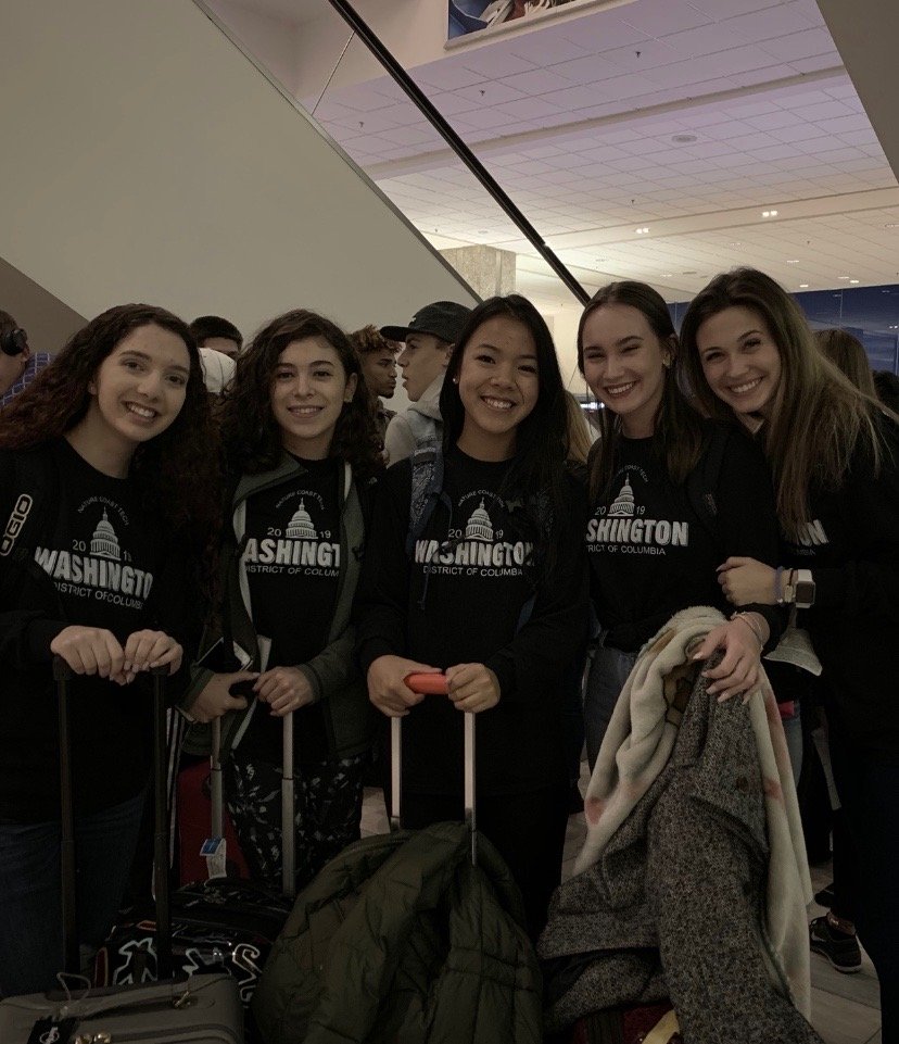 High school friends at airport