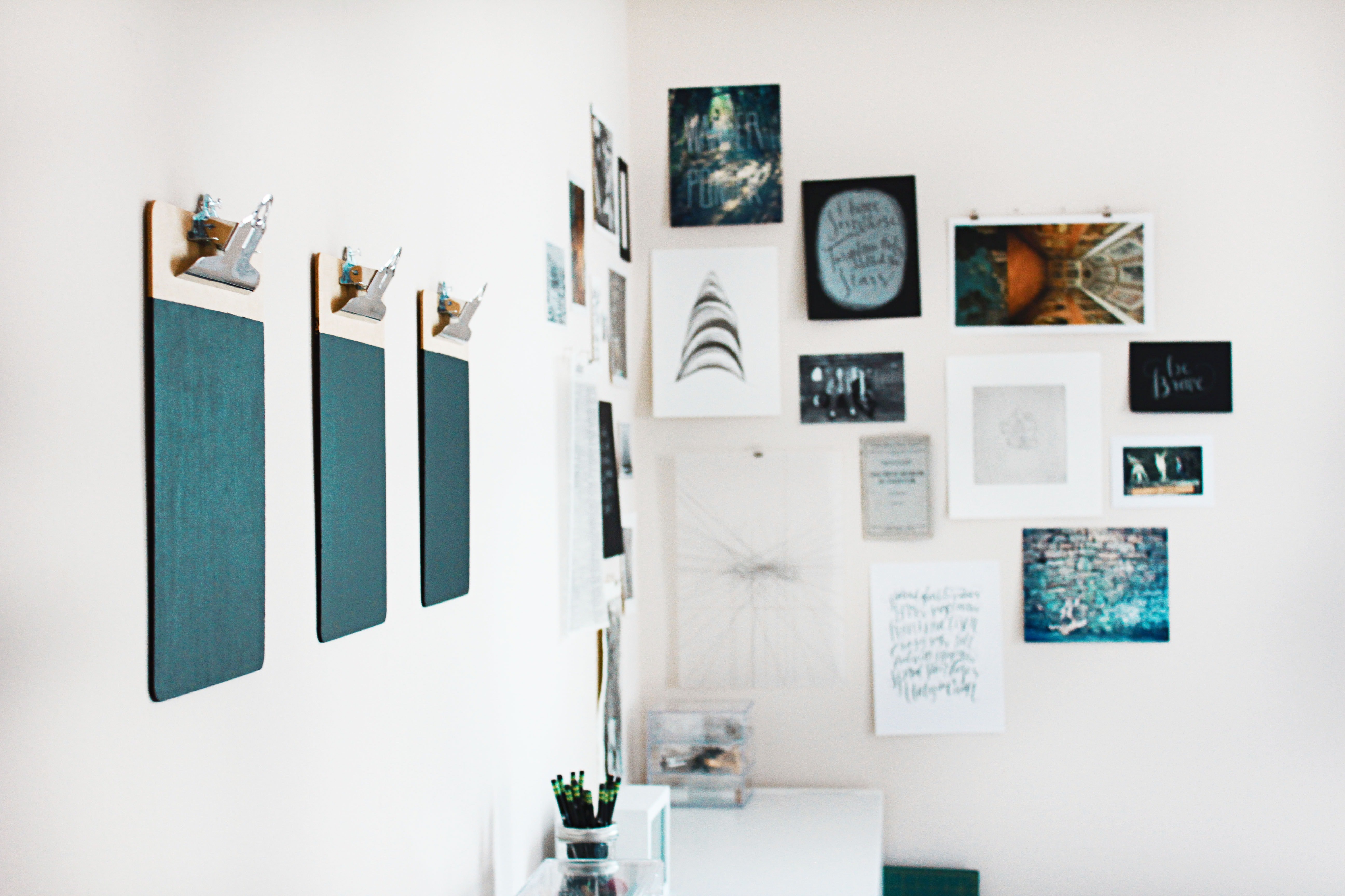 a gallery wall of small art pieces