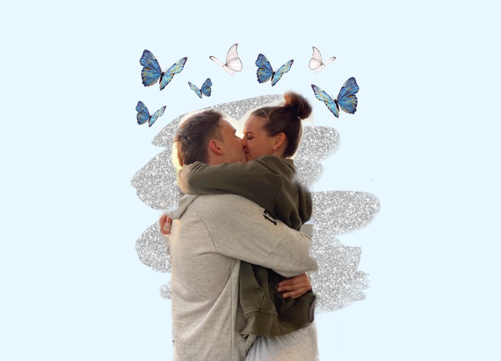 Couple kissing with butterflies