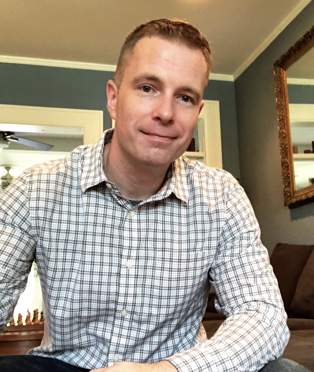 Mike with plaid shirt