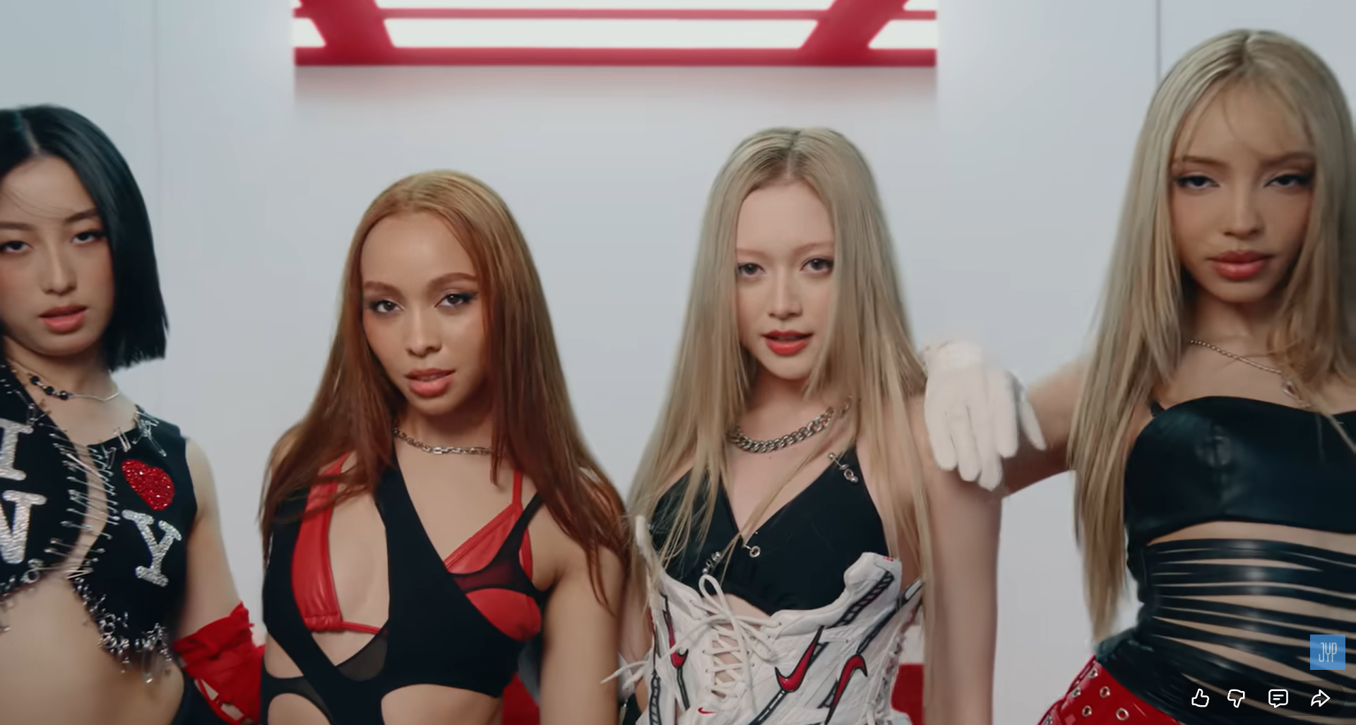 Girlset in a room looking at camera