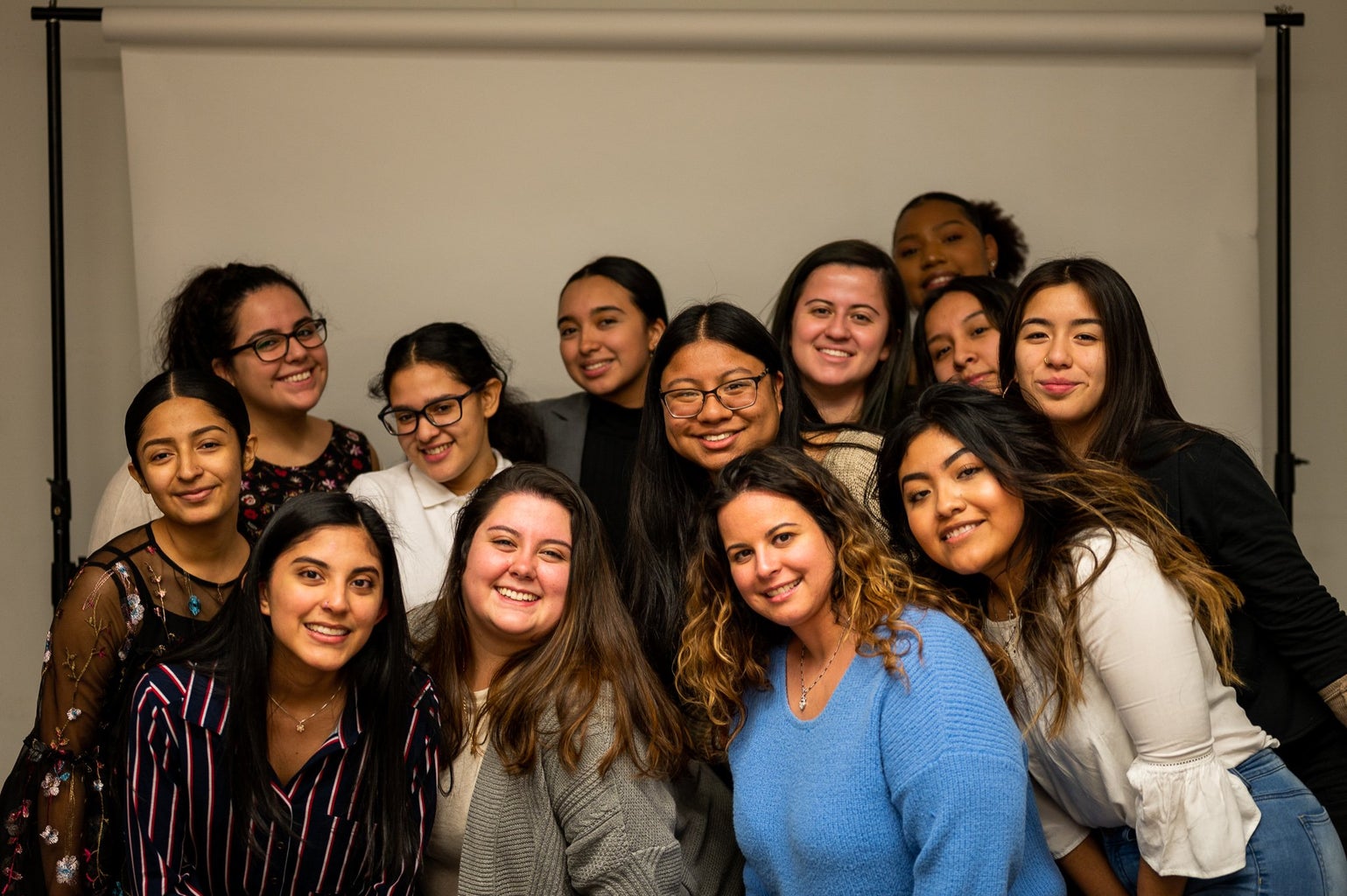 A group of women in a student organization at Rutgers pose at one of their events.
