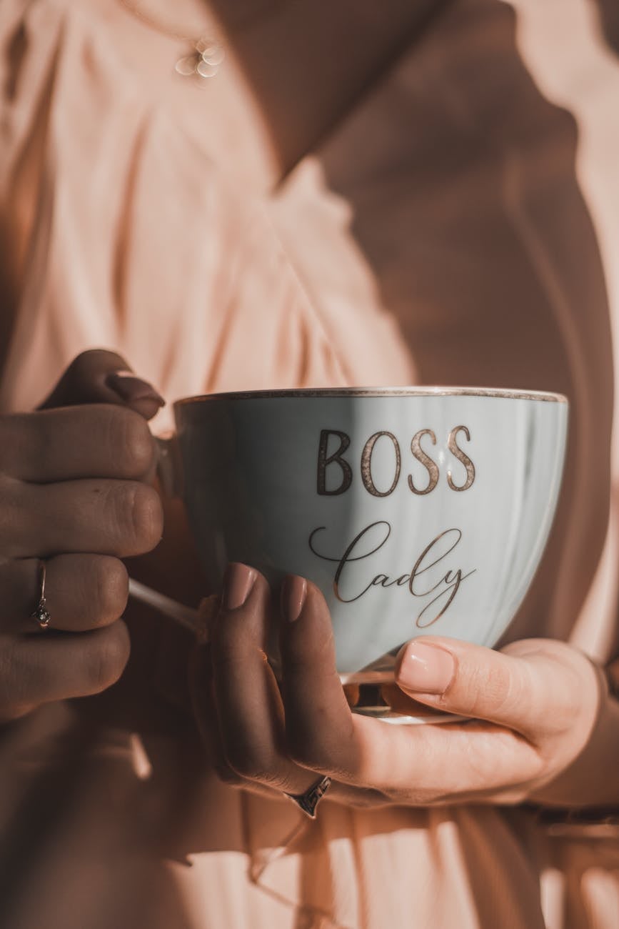 woman holding coffee cup saying boss lady