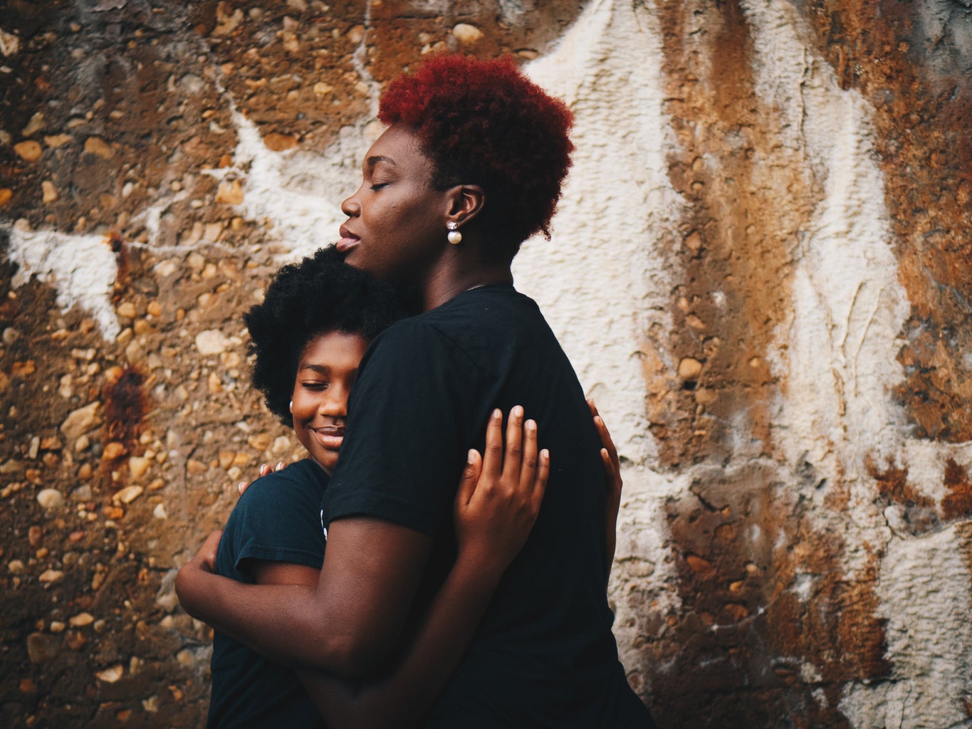 Mother holding her daughter