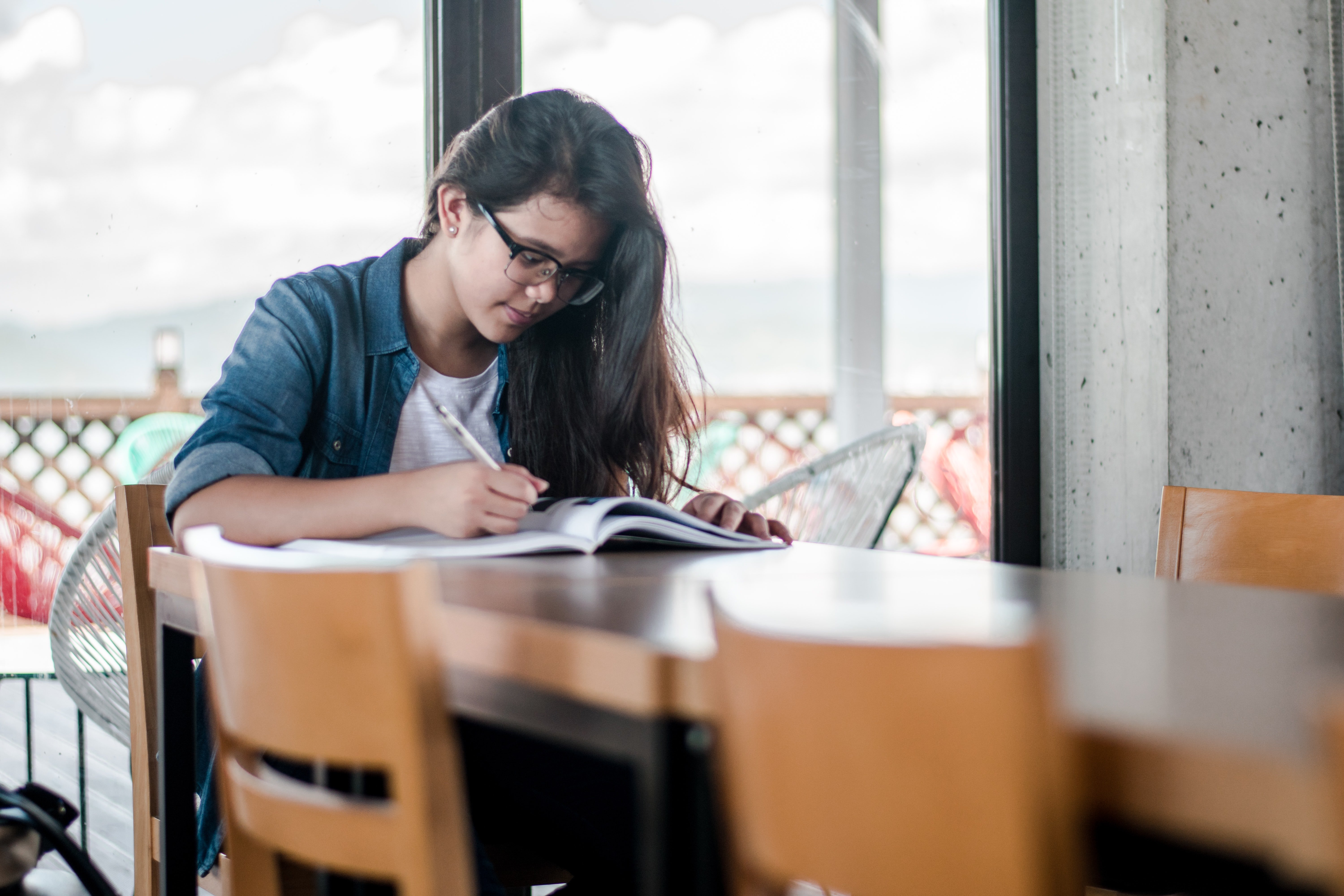 woman studying with a book