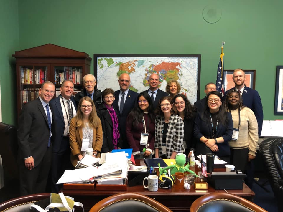 People posing in an office