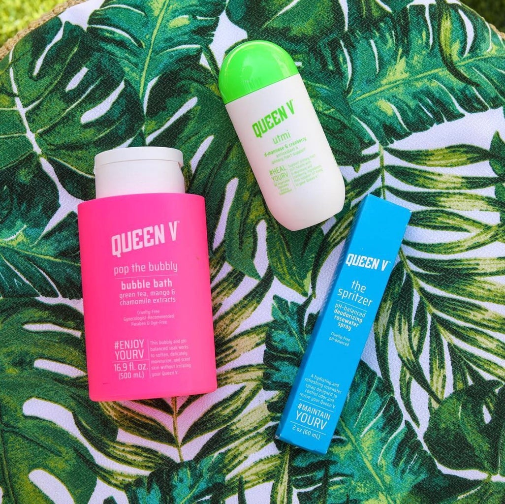 queen v products with leafy background