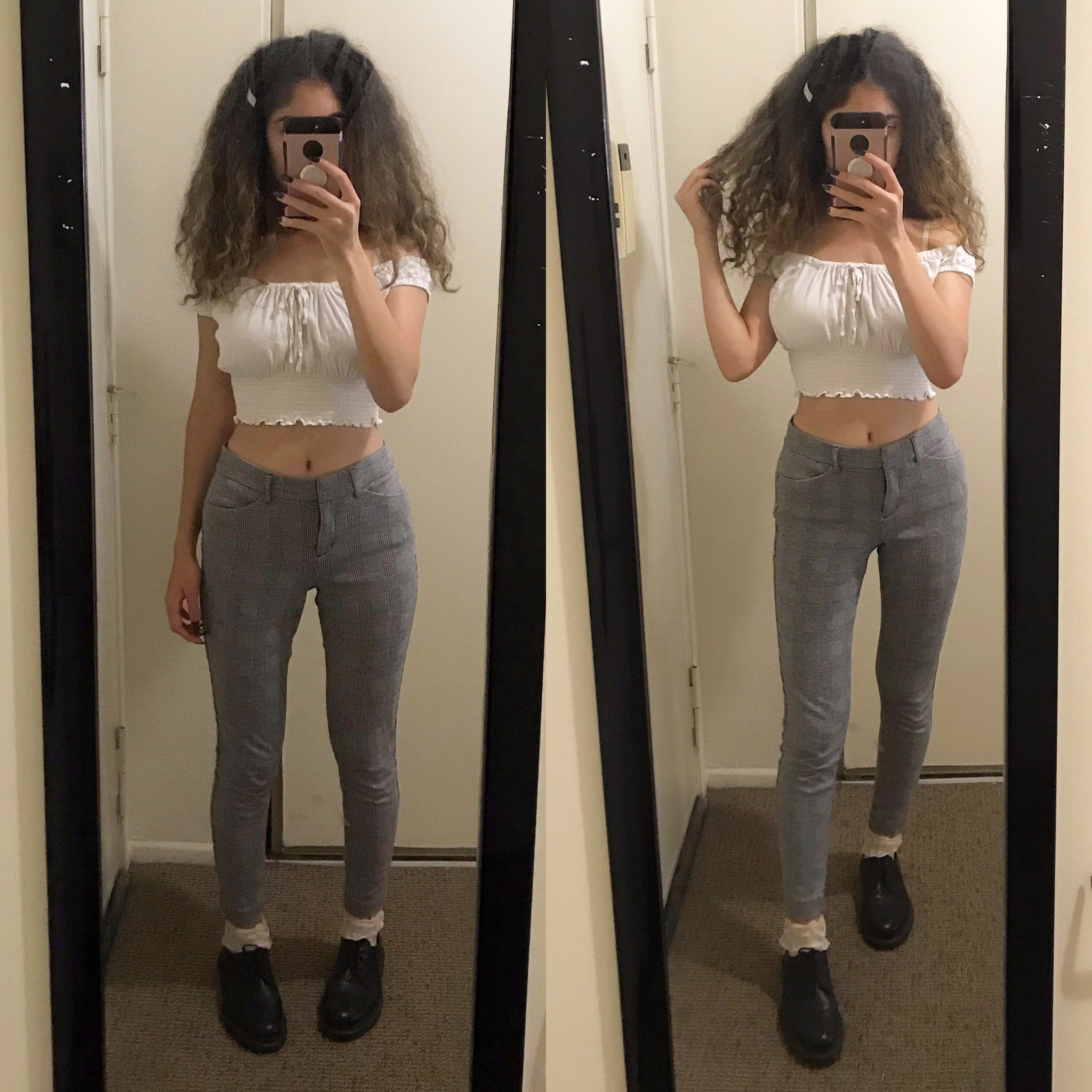 mirror selfie of a girl wearing a crop top and plaid pants