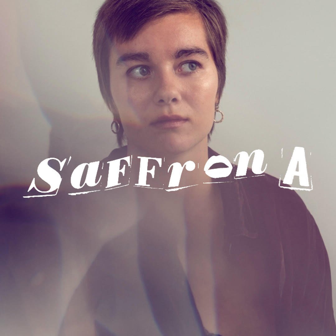 Woman portrait, she is looking away from camera and her name is added on top of the image.