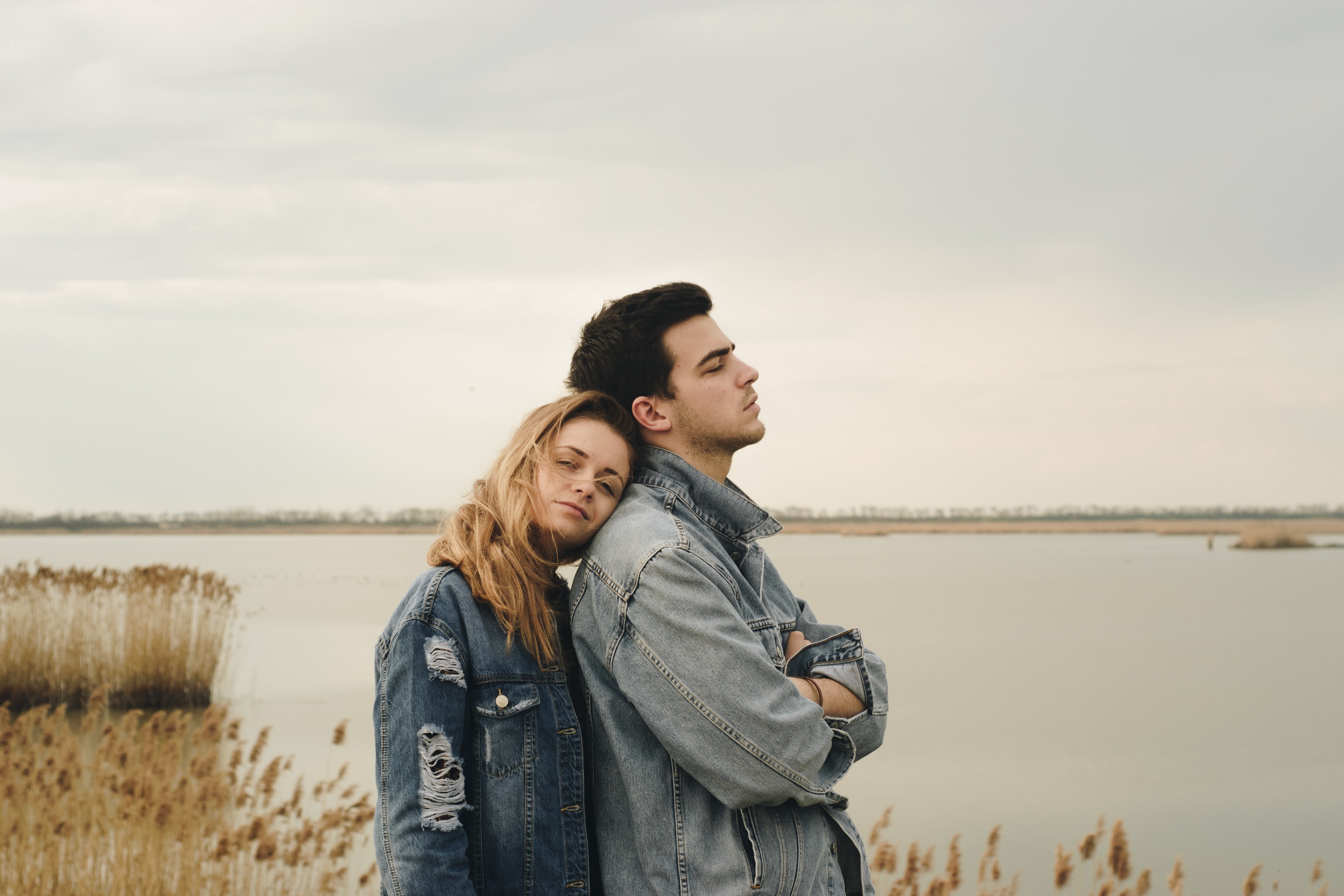 Couple wearing denim jackets