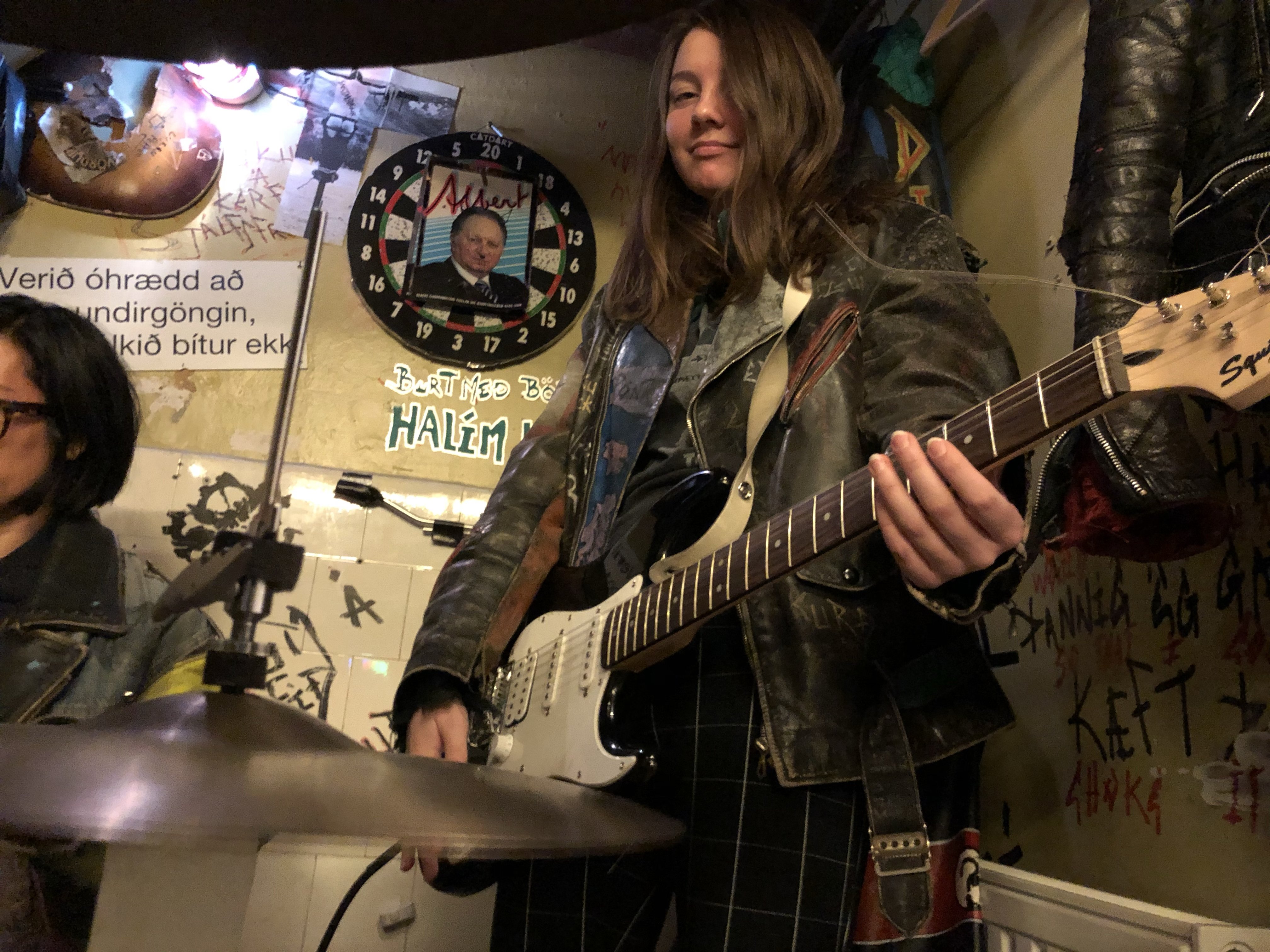 Myself at Icelandic Punk Museum with guitar