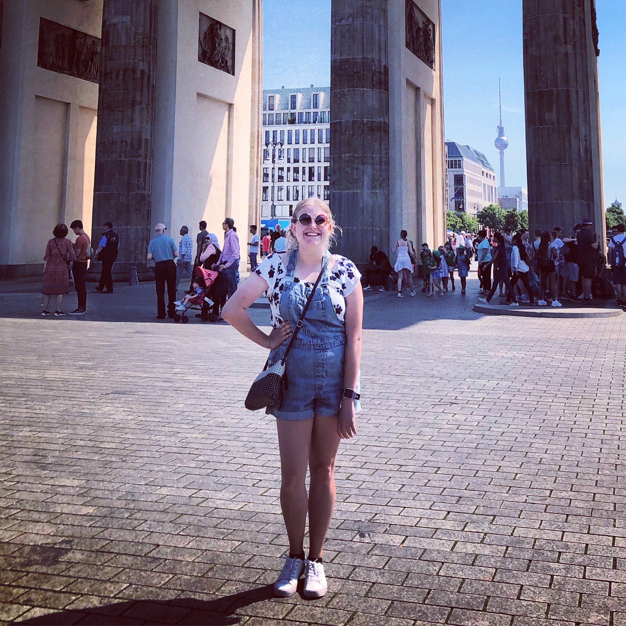 Girl with disney shirt standing with hand on hips