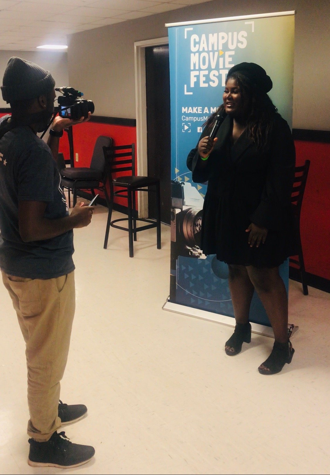 black woman celebrating her movie success