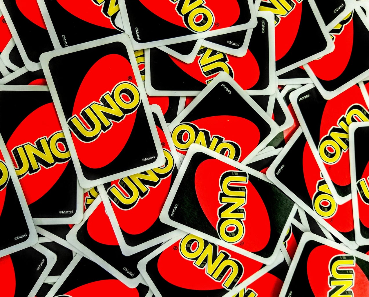 Uno cards spread out everywhere