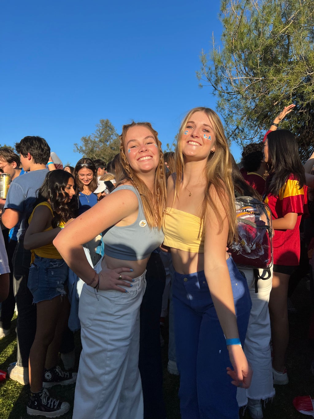 picture of two girls at UCLA football game
