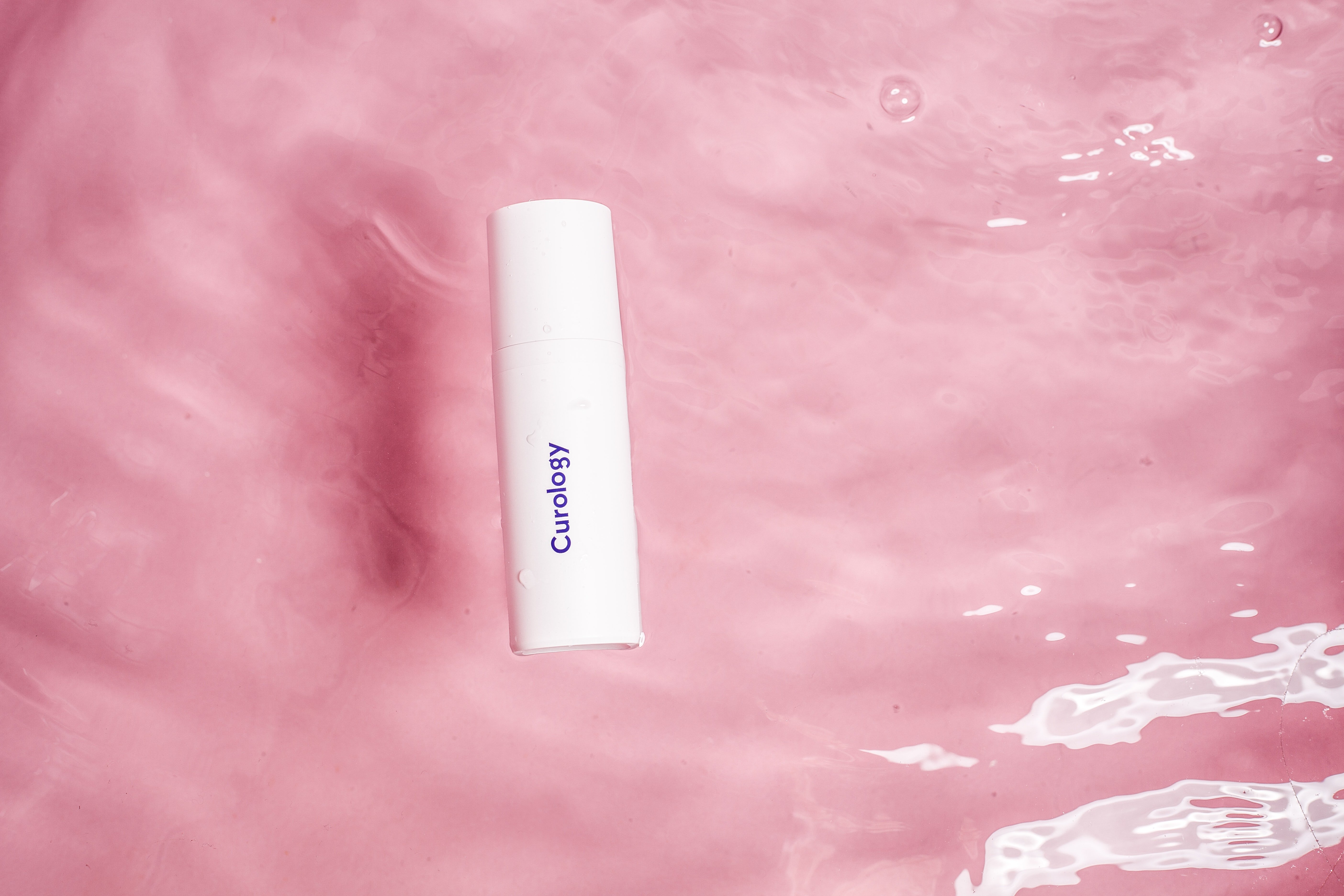 Curology in pink water