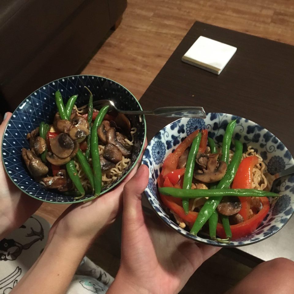 Two bowls of stir fry