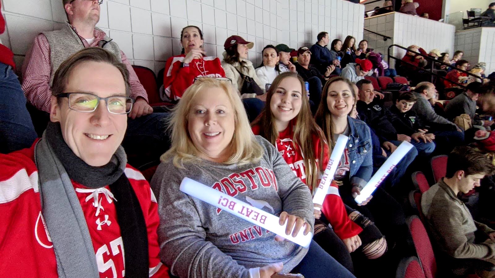 family at a Boston University hockey game