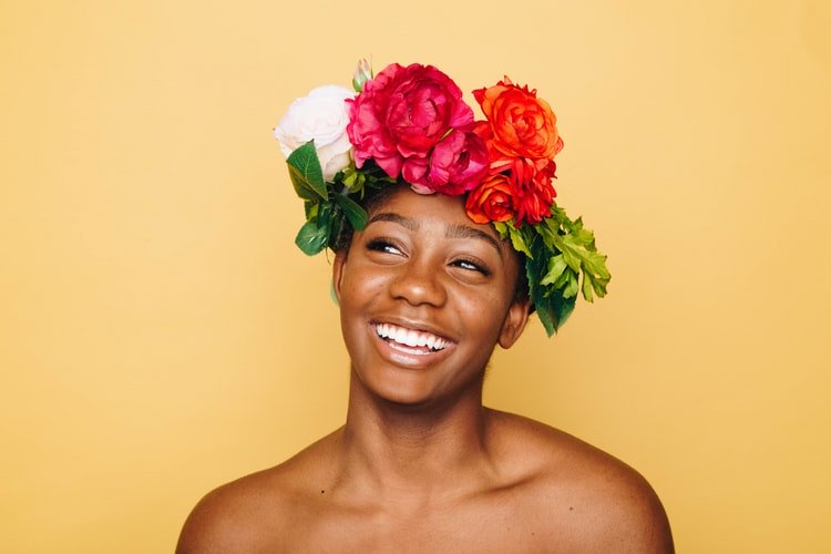 woman smiling with flower crownjpegjpg by unsplash?width=698&height=466&fit=crop&auto=webp&dpr=4