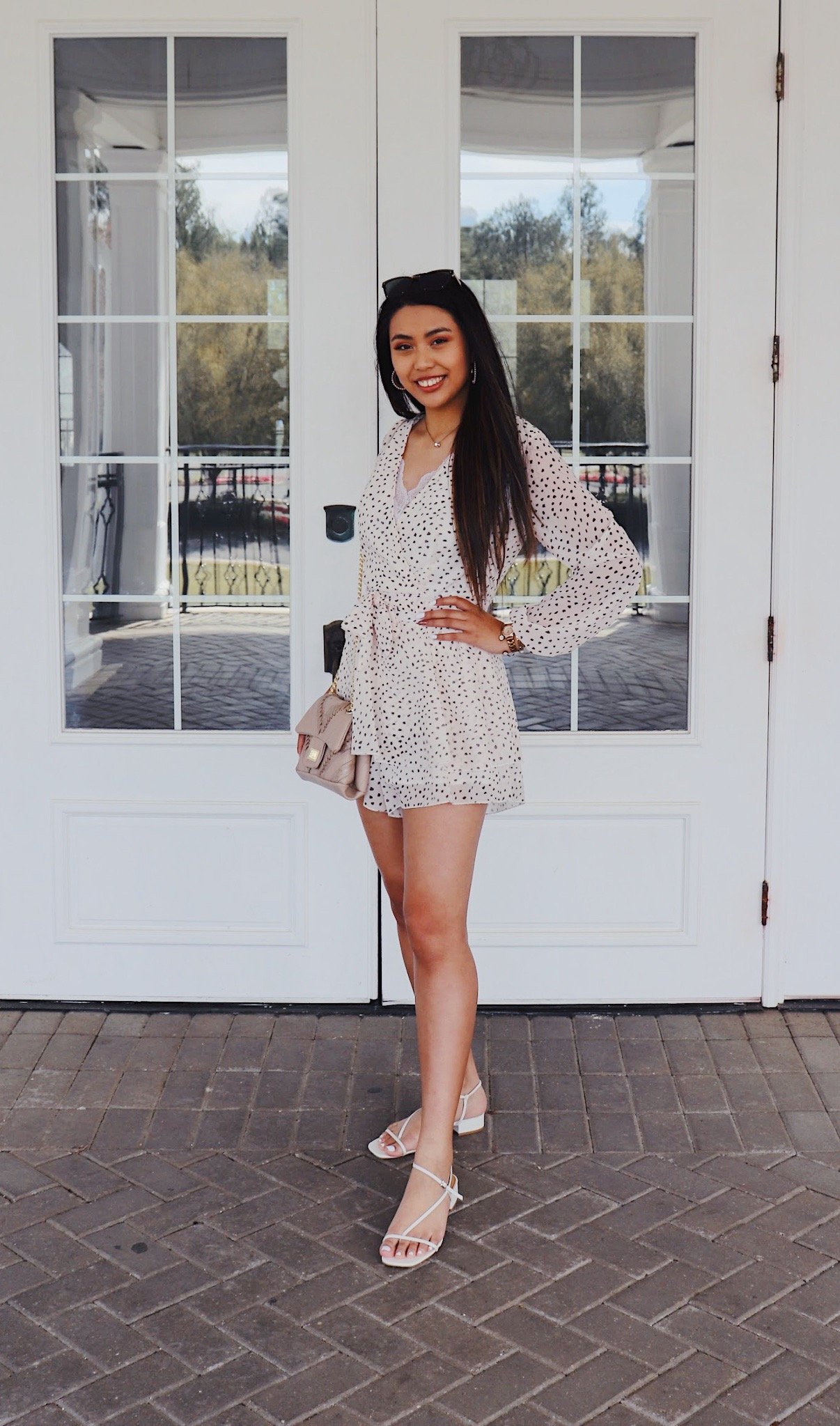 Girl in polka dot romper