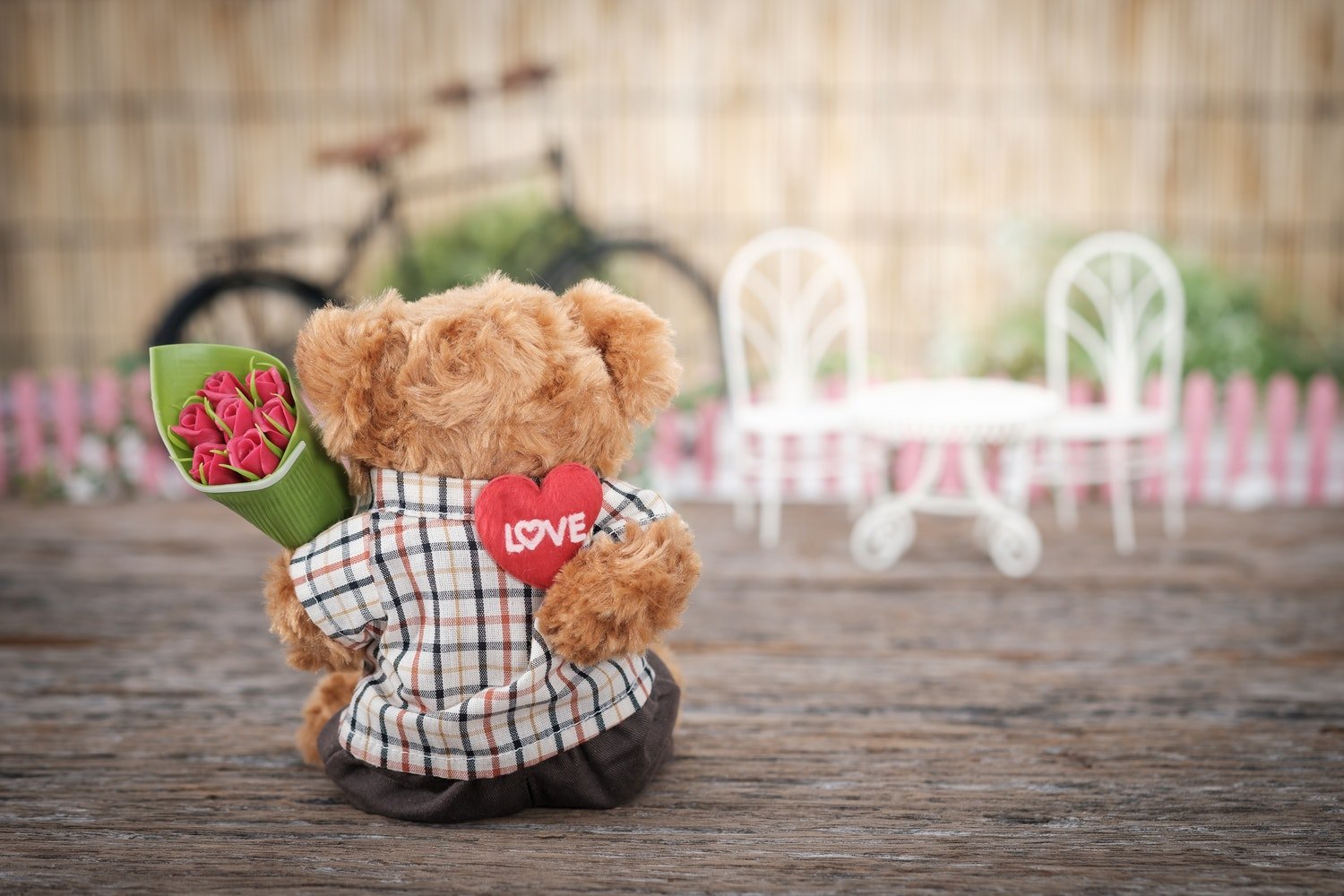 brown bear plush toy holding red rose flower 1028729jpg?width=698&height=466&fit=crop&auto=webp&dpr=4