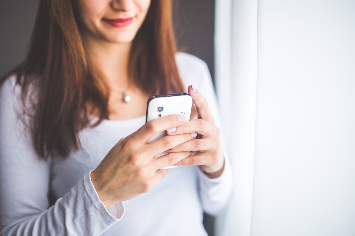 close up portrait of a young woman typing a text message on 6400jpg?width=698&height=466&fit=crop&auto=webp&dpr=4