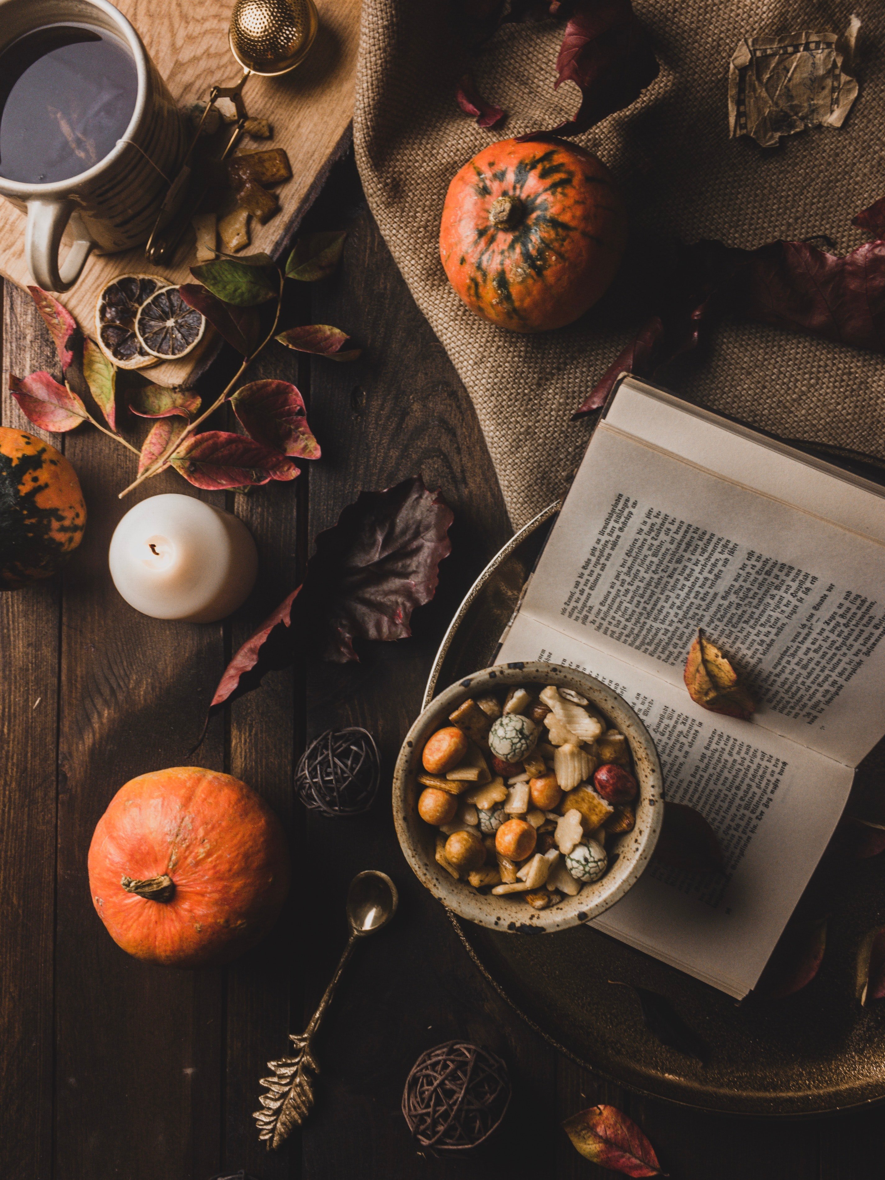 top view of a book and a cup of tea surrounded with an 3193647jpg?width=698&height=466&fit=crop&auto=webp&dpr=4