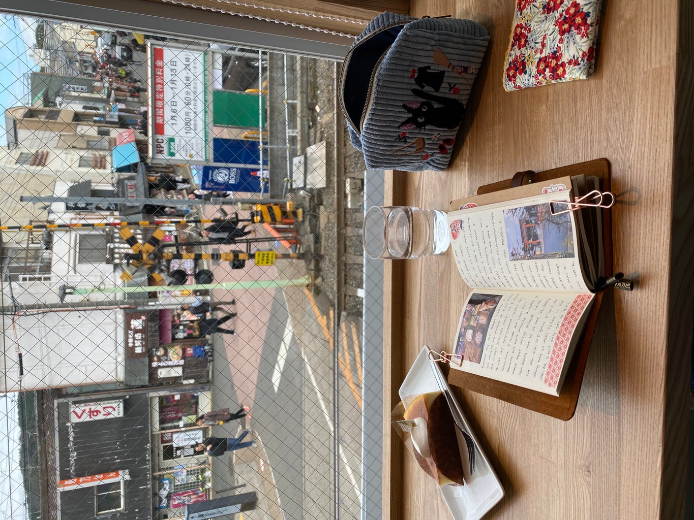 journaling at coffeeshop outside of fushimi inari shrines, travel
