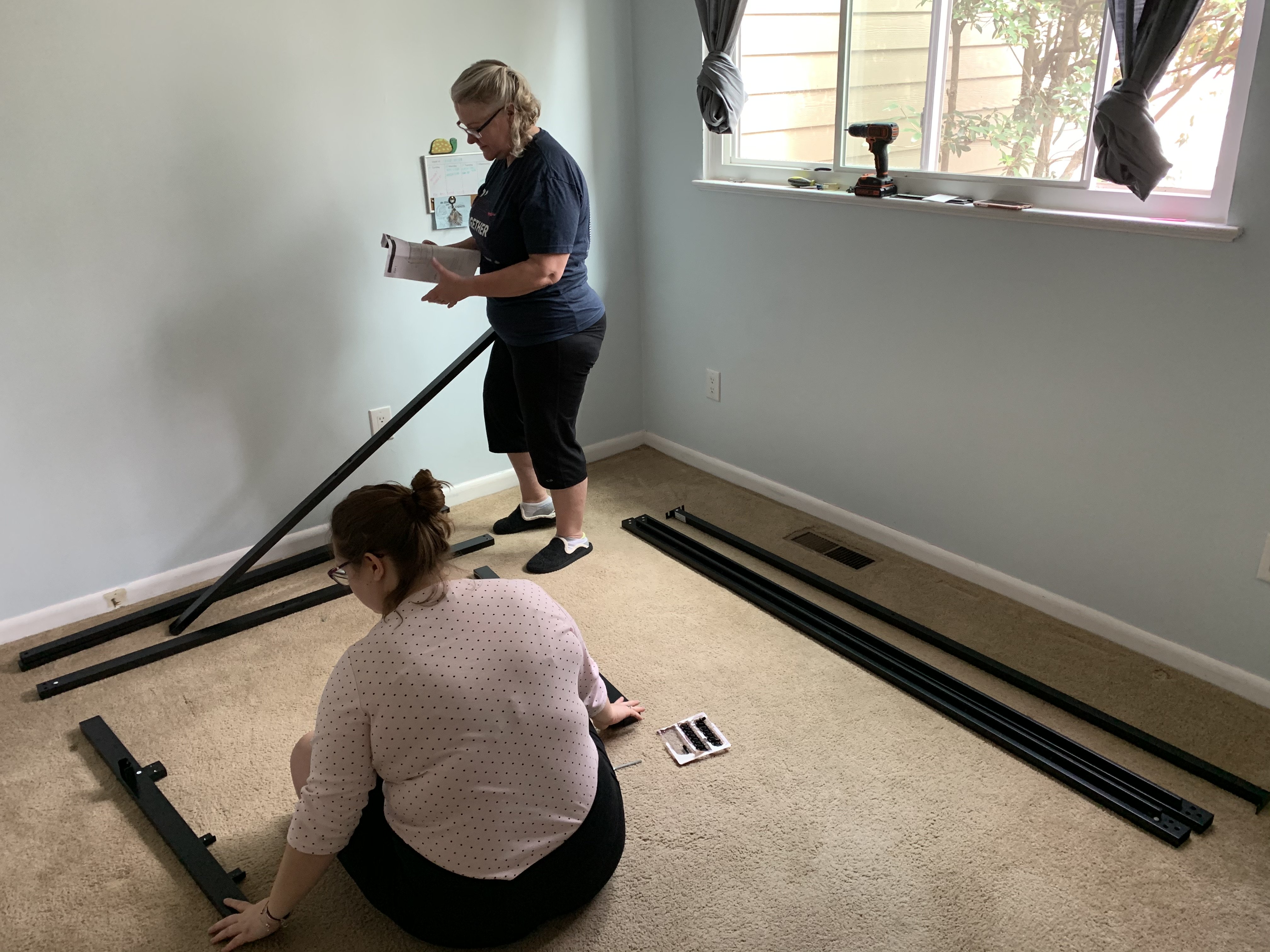 people building a bedframe