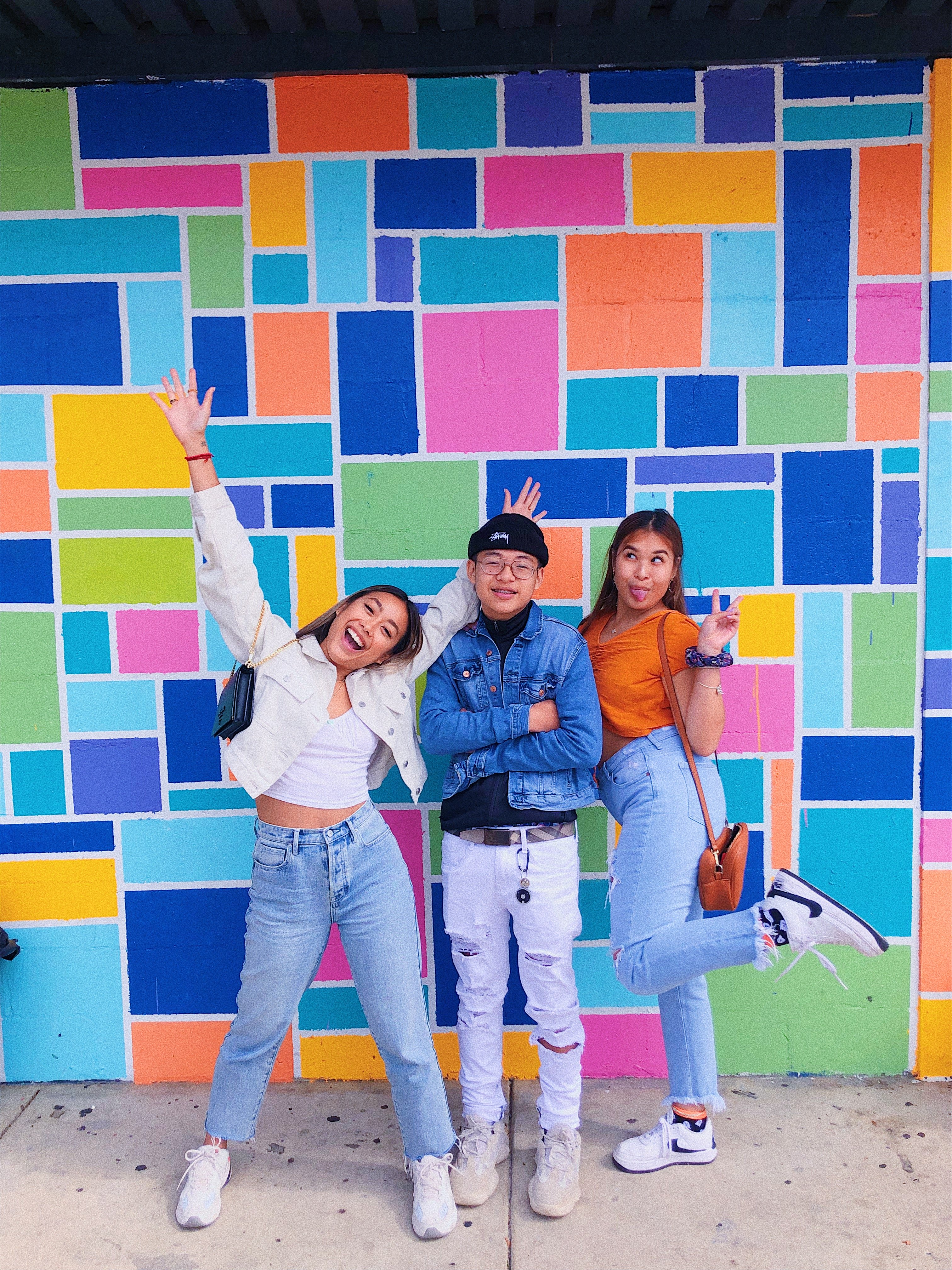 chapter member posing with her two siblings