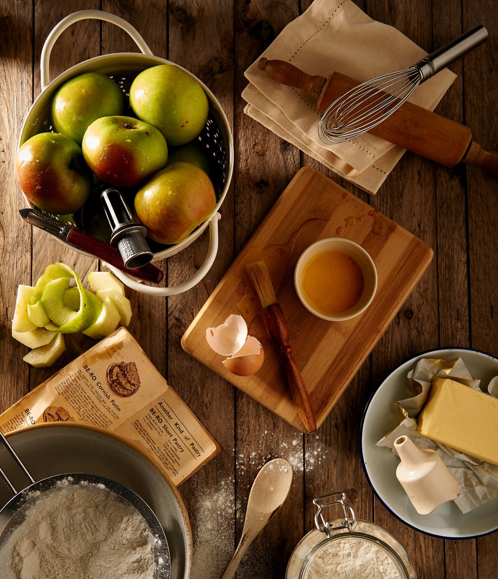 Ingredients for baking a pie on a wooden countertop