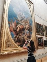 inspired girl in Parisian museum