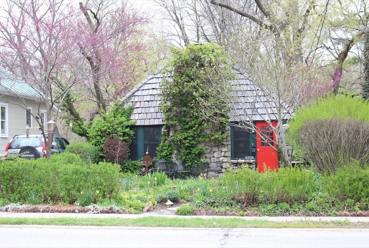 small cottage with red door in Iowa City