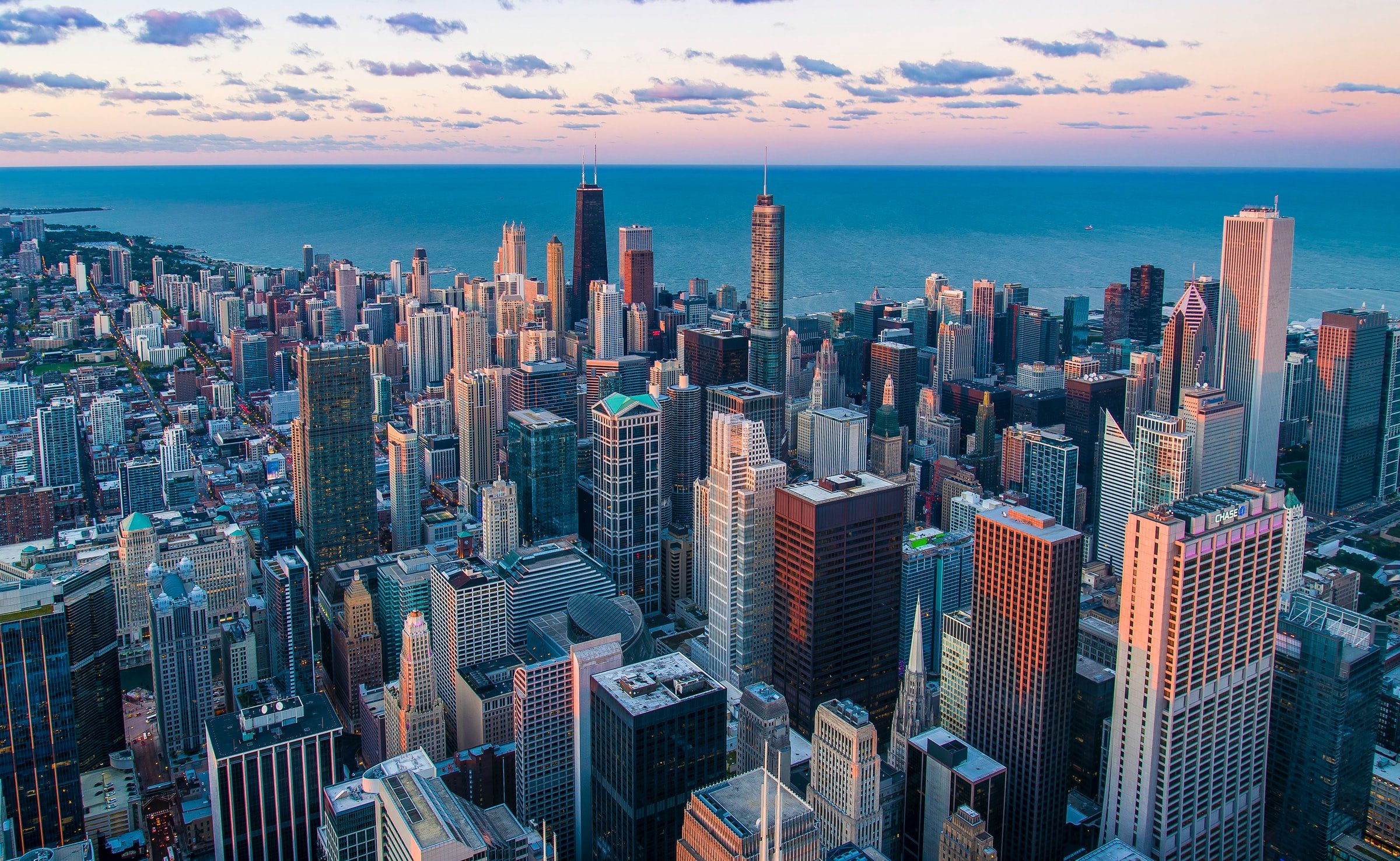 aerial view of sunrise in Chicago by unsplash?width=698&height=466&fit=crop&auto=webp&dpr=4