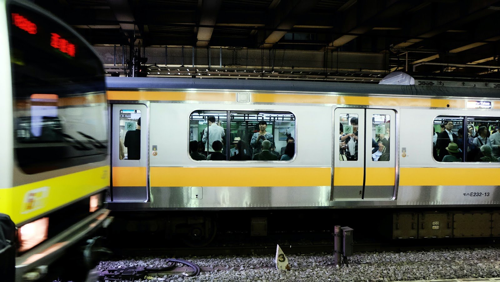 Japan train station by Daryan Shamkhali via Unsplash