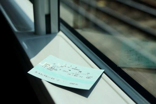 Japanese bullet train ticket by Evelyn Liow via Unsplash